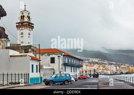 Candelaria, Tenerife, Spain - December 12, 2019: Old church an waterfront in Candelaria town Stock Photo
