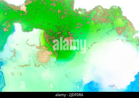 Alcohol-based ink on paper in blue and green colors on white background. Copy space. Stock Photo