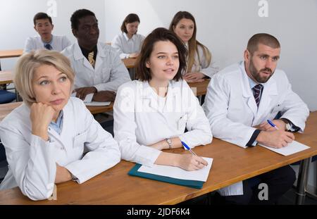 Group of physicians during seminar Stock Photo