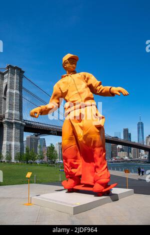 Giant orange skateboarder sculpture celebrating Louix Vuitton x Nike Air  Force 1 designed by Virgil Abloh. Brooklyn Bridge Park, New York City, USA  Stock Photo - Alamy