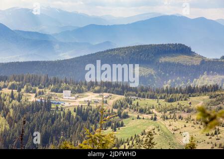 Industrial oil production among mountains and forests in the Ukrainian Carpathians, Gorgany, Ukraine Stock Photo