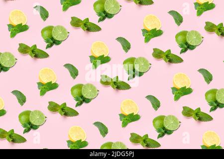Many mint leaves, limes and lemons on pink background. Pattern for design Stock Photo