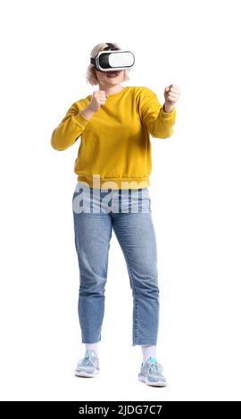 Beautiful blonde woman in VR glasses on white background Stock Photo