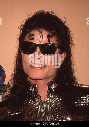 Michael Jackson being presented  an Award in recognition of his work in favor of humanitarian causes September 14, 1990.  Credit: Ralph Dominguez/MediaPunch Stock Photo
