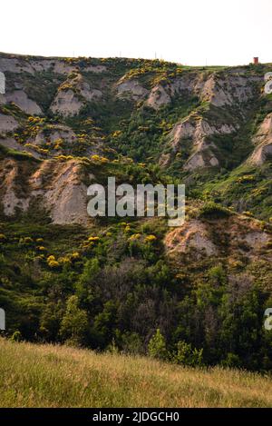 Eroded hills in Montespino, near Pesaro and Urbino in Italy, at evening before the sunset Stock Photo