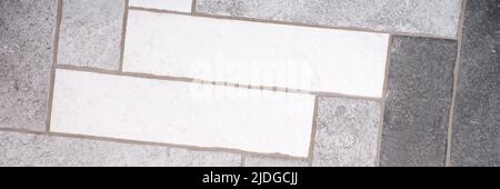 Rectangular floor tiles in white and gray tones Stock Photo