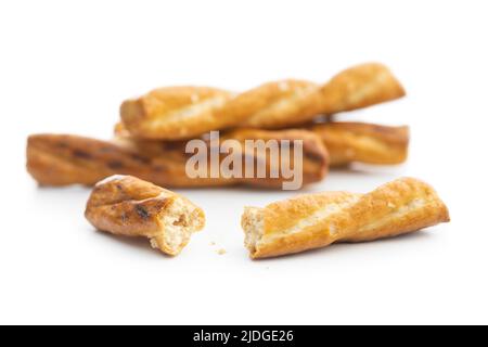Salted pretzel sticks. Salted crackers isolated on a white background. Stock Photo