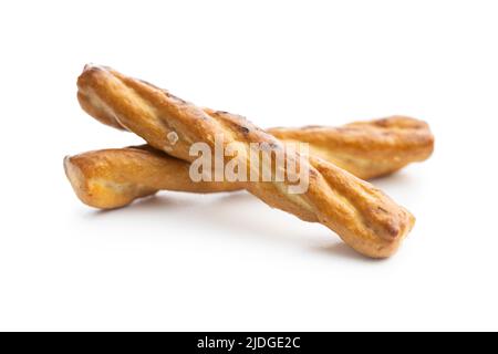 Salted pretzel sticks. Salted crackers isolated on a white background. Stock Photo