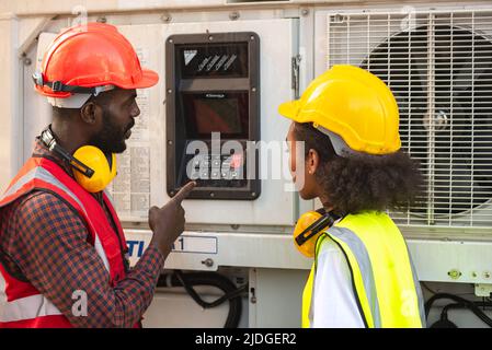 Engineer control reefer with air conditioner at Container box. Stock Photo