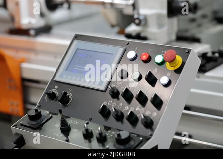 Operator console of metalworking grinder machine. Selective focus. Stock Photo