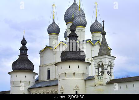 Heads of churches of Rostov. The domes of the Church of the Resurrection behind the fortress towers of the Kremlin. Russian architecture of the XVII c Stock Photo
