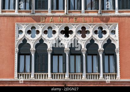 Hotel Danieli, five-star luxury, world renowned. Venetian Gothic style facade. Venice, Italy, Europe, EU. Hotel sign name. Close up. Stock Photo