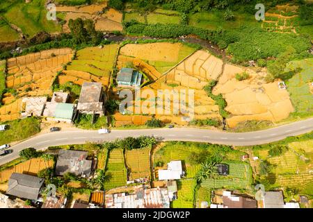 A village in the mountains among agricultural lands and tea plantations. Nuwara Eliya, Sri Lanka. Stock Photo