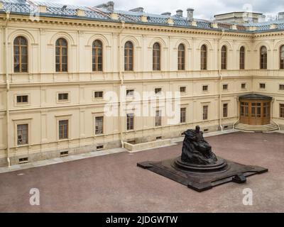 Gatchina, Russia - May 15, 2022: monument to Emperor Alexander III in inner court of Great Gatchina Palace. Gatchina Palace received UNESCO World Heri Stock Photo