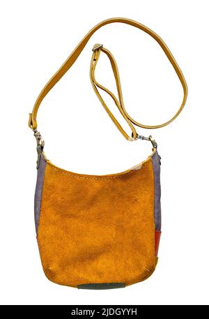 handmade crossbody bag hand sewn from soft yellow suede cutout on white background Stock Photo