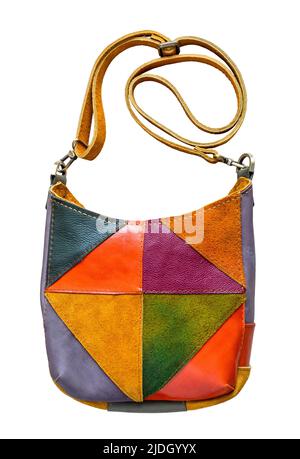 patchwork crossbody bag hand sewn from suede and leather cutout on white background Stock Photo