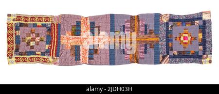 handcrafted crinkled silk patchwork scarf with geometric pattern cutout on white background Stock Photo