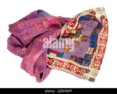 wrapped handcrafted patchwork scarf from purple silk fabrics cutout on white background Stock Photo