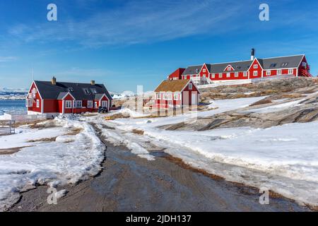 beautiful red houses cityscape in Ilulissat Greenland Stock Photo