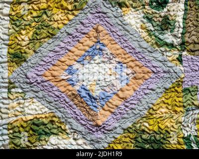 handcrafted geometric pattern of crinkled patchwork sllk scarf Stock Photo