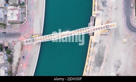 Aerial drone top view to Dubai canal and the Twisted bridge on sunrise, United Arab Emirates, Middle East Stock Photo