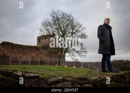 Christopher Brookmyre, author, at Bothwell Castle, near to his home in Bothwell, Scotland, 2 March 2022. Stock Photo