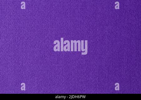 Purple violet color felt textile fabric texture background Stock Photo