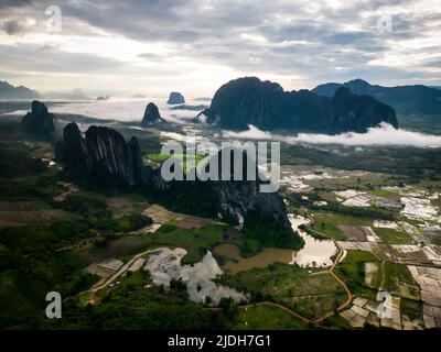 (220621) -- VIENTIANE, June 21, 2022 (Xinhua) -- Aerial photo taken on June 19, 2022 shows the landscape of Muang Fueng, a rising tourist town some 100 km north of Lao capital Vientiane. (Photo by Kaikeo Saiyasane/Xinhua) Stock Photo