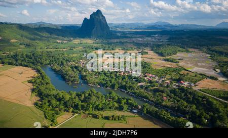 (220621) -- VIENTIANE, June 21, 2022 (Xinhua) -- Aerial photo taken on June 17, 2022 shows the landscape of Muang Fueng, a rising tourist town some 100 km north of Lao capital Vientiane. (Photo by Kaikeo Saiyasane/Xinhua) Stock Photo