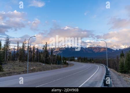 Trans-Canada Highway 16, Yellowhead Highway, Alberta Provincial Highway No. 16 in dusk. Canadian Rockies, Jasper National Park, Canada. Stock Photo