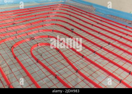 Underfloor surface heating pipes. Low temperature heating Stock Photo