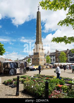 Busy Market Place around the obelisk on market day at Ripon North Yorkshire England Stock Photo