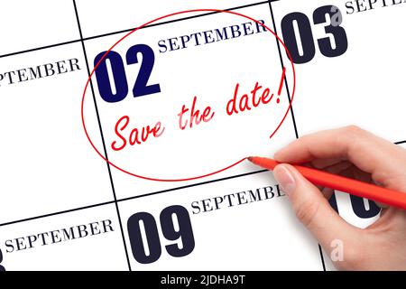 2nd day of September. Hand drawing red line and writing the text Save the date on calendar date September  2.  Autumn month, day of the year concept. Stock Photo