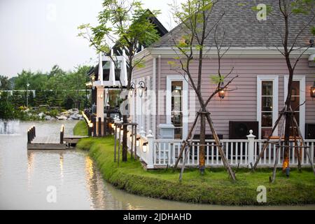 Bangkok, Thailand - September 08 2013: Restaurant by the pond at Chocolate Ville a fun and unique European Village theme place with plenty of restaura Stock Photo