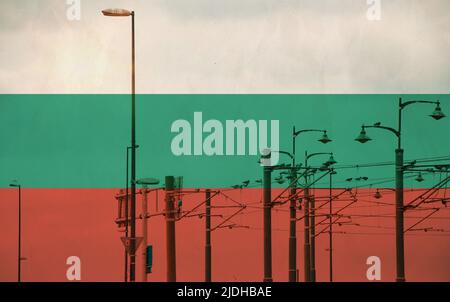 Bulgaria flag with tram connecting on electric line with blue sky as background, electric railway train and power supply lines, cables connections and Stock Photo