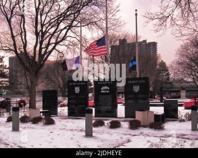 Fallen Police Memorial in Forman Park in downtown Syracuse, New York, in the wintertime Stock Photo