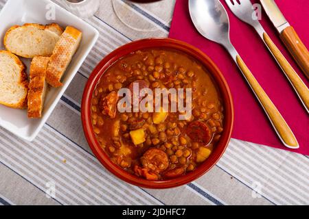 Stewed lentils with sausages, spanish Riojan lentils Stock Photo