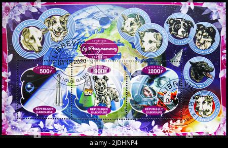 MOSCOW, RUSSIA - JUNE 17, 2022: Postage stamp printed in Gabon shows Block: Dogs - Astronauts, Space programs serie, circa 2020 Stock Photo