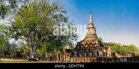 Stupa shrine and ruins of the Si Satchanalai historical Buddhist park in Thailand Stock Photo
