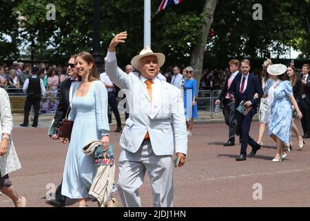 A celebrating man waves to the crowd at the Queen's Platinum Jubilee Celebrations 2022 Stock Photo