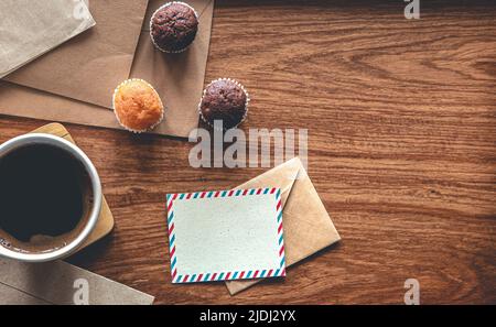Vintage composition with envelopes on wooden background, flat lay. Stock Photo