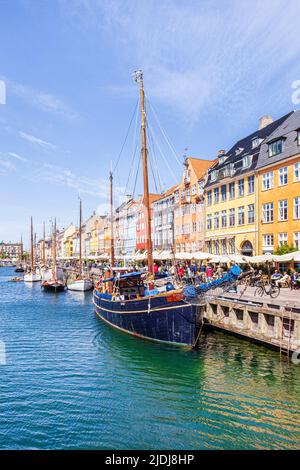 An old fishing boat 'Wotan' moored at Nyhavn, the colourful 17th-century canal waterfront in Copenhagen, Denmark. Stock Photo