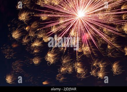 Berlin, Germany. 14th May, 2022. A firework rocket explodes in the night sky during the May Days fireworks display at Volkspark Hasenheide. Credit: Hauke Schröder/dpa-Zentralbild/dpa/Alamy Live News Stock Photo