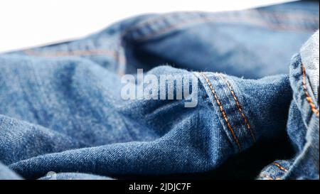 Gorgeous jeans texture, wrinkled jeans, fabric textured background, cloth material texture, concept with abstract art. Background. Abstract art for wa Stock Photo