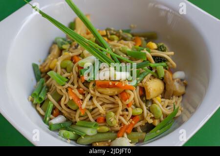 Pasta Noodle Salad with Onions Beans and Carrots Stock Photo