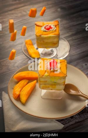Mango mousse on a plate with copy space Stock Photo