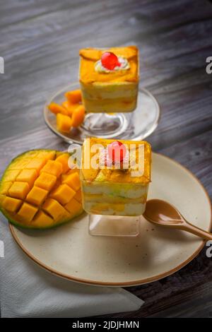 Mango mousse on a plate with copy space Stock Photo