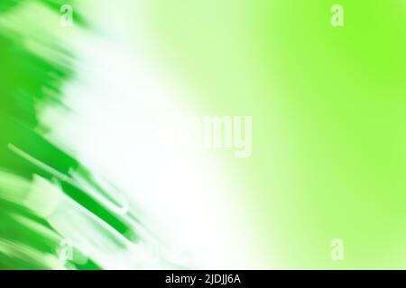 Zoomed abstract green background with radial radiating lines. Abstract green image of  light zoom trails. Stock Photo