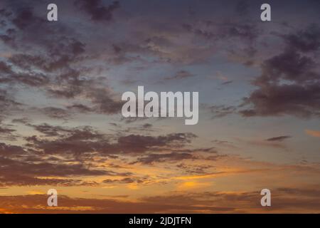 Dramatic sunset sky, cloudscape with colorful twilight clouds Stock Photo