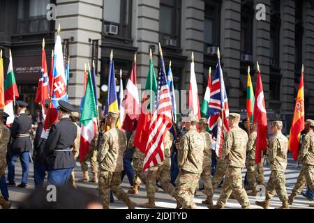 Manhattan, New York, USA - November 11. 2019: Flags of NATO members. Soldiers holding flags of North Atlantic treaty Organization Stock Photo